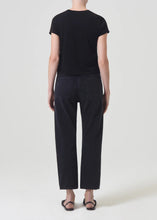 Load image into Gallery viewer, Agolde's best-selling 90's Jean with the much-requested cropped inseam. This decade inspired mid-rise is designed to sit relaxed at the waist with an easy fit through the hips into a classic, loose straight leg. Style back to anything and everything. Available at aprilmae - a womenswear boutique located in Chiswick west London specialising in contemporary, everyday clothing for women. Visit our shop on Devonshire Road W4 for the latest arrivals from brands including Rains, Rails, Bellerose, and Bonte.