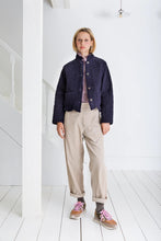 Load image into Gallery viewer, Dillis by Bonte  is a versatile + softly utility inspired quilted jacket, slightly cropped with a feminine scallop detail at the neck and hem.Made in organic cotton baby cord + a printed lining, with a button front detail with mock-horn buttons and two patch pockets. Available at aprilmae - a womenswear boutique located in Chiswick west London specialising in contemporary, everyday clothing for women.  Visit our shop on Devonshire Road W4 for the latest arrivals from brands including Rains, Rails, Bellerose
