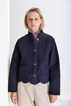 Load image into Gallery viewer, Dillis by Bonte  is a versatile + softly utility inspired quilted jacket, slightly cropped with a feminine scallop detail at the neck and hem.Made in organic cotton baby cord + a printed lining, with a button front detail with mock-horn buttons and two patch pockets. Available at aprilmae - a womenswear boutique located in Chiswick west London specialising in contemporary, everyday clothing for women.  Visit our shop on Devonshire Road W4 for the latest arrivals from brands including Rains, Rails, Bellerose
