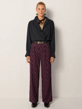 Load image into Gallery viewer, Celeste by Maison Hotel  is a soft viscose shirt with texture and lightness. The blue tone softens into a lived-in wash.  Ruffles trim the collar, placket, and cuffs, adding movement and a romantic edge. The relaxed fit makes it endlessly wearable.  Available at aprilmae - a womenswear boutique located in Chiswick west London specialising in contemporary, everyday clothing for women.  Visit our shop on Devonshire Road W4 for the latest arrivals from brands including Rains, Rails, Bellerose and Bonte.
