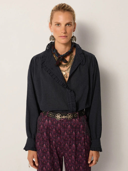 Celeste by Maison Hotel  is a soft viscose shirt with texture and lightness. The blue tone softens into a lived-in wash.  Ruffles trim the collar, placket, and cuffs, adding movement and a romantic edge. The relaxed fit makes it endlessly wearable.  Available at aprilmae - a womenswear boutique located in Chiswick west London specialising in contemporary, everyday clothing for women.  Visit our shop on Devonshire Road W4 for the latest arrivals from brands including Rains, Rails, Bellerose and Bonte.