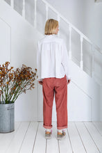 Load image into Gallery viewer, Etienne shirt by Bonte in white.  A relaxed + easy smock-style shirt in an organic cotton double-gauze, with detailed eyelet embroidery on the collar, placket and cuffs. The centre front has a concealed half-placket opening to the waist, with mock horn buttons + loop closure with, fine pleats on either side. Oversized fit. Available at aprilmae - a womenswear boutique located in Chiswick west London specialising in contemporary, everyday clothing for women.  Visit our shop on Devonshire Road W4.
