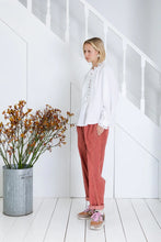 Load image into Gallery viewer, Etienne shirt by Bonte in white.  A relaxed + easy smock-style shirt in an organic cotton double-gauze, with detailed eyelet embroidery on the collar, placket and cuffs. The centre front has a concealed half-placket opening to the waist, with mock horn buttons + loop closure with, fine pleats on either side. Oversized fit. Available at aprilmae - a womenswear boutique located in Chiswick west London specialising in contemporary, everyday clothing for women.  Visit our shop on Devonshire Road W4.
