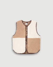 Load image into Gallery viewer, Hartford sleeveless women&#39;s vest in curly faux-fur patchwork. No buttons. Exclusive leopard print lining. Contrasting bias trim. Available at aprilmae - a womenswear boutique located in Chiswick west London specialising in contemporary, everyday clothing for women.  Visit our shop on Devonshire Road W4 for the latest arrivals from brands including Rains, Rails, Bellerose, Bonte, Vanessa Bruno and Colorful Standard.
