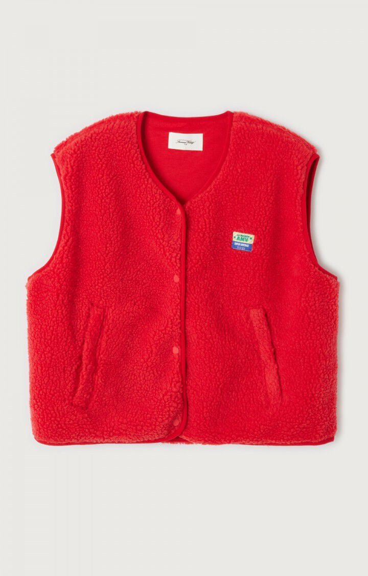  A red fleece gilet with snap button closure, zip pockets, and an American Vintage patch logo on the left chest area. Hoktown hooded fleece by American Vintage in strawberry red. Available at aprilmae - a womenswear boutique located in Chiswick west London specialising in contemporary, everyday clothing for women.  Visit our shop on Devonshire Road W4 for the latest arrivals.