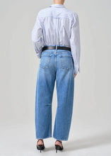Load image into Gallery viewer, The Miro jean by Citizens of Humanity is a tapered take on the barrel leg silhouette. Shown in faded blue with a vintage hand feel. Available at aprilmae - a womenswear boutique located in Chiswick west London specialising in contemporary, everyday clothing for women.  Visit our shop on Devonshire Road W4 for the latest arrivals from brands including Rains, Rails, Bellerose, Bonte, Vanessa Bruno, Hartford and Colorful Standard.
