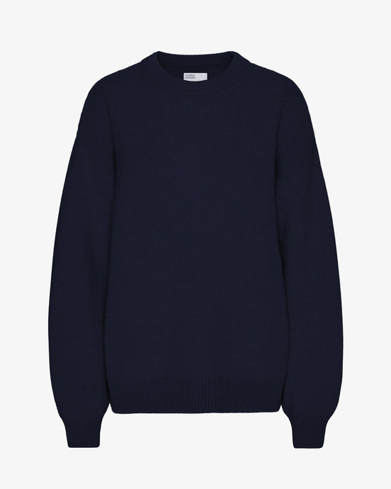 Colourful Standard Women's Merino Wool Oversized Crew in Navy Blue the epitome of cozy sophistication. Crafted from premium recycled merino wool, this oversized crewneck sweater offers unparalleled softness, breathability, and temperature regulation for year-round comfort.Available at aprilmae - a womenswear boutique located in Chiswick west London specialising in contemporary, everyday clothing for women.  Visit our shop on Devonshire Road W4 for the latest arrivals.