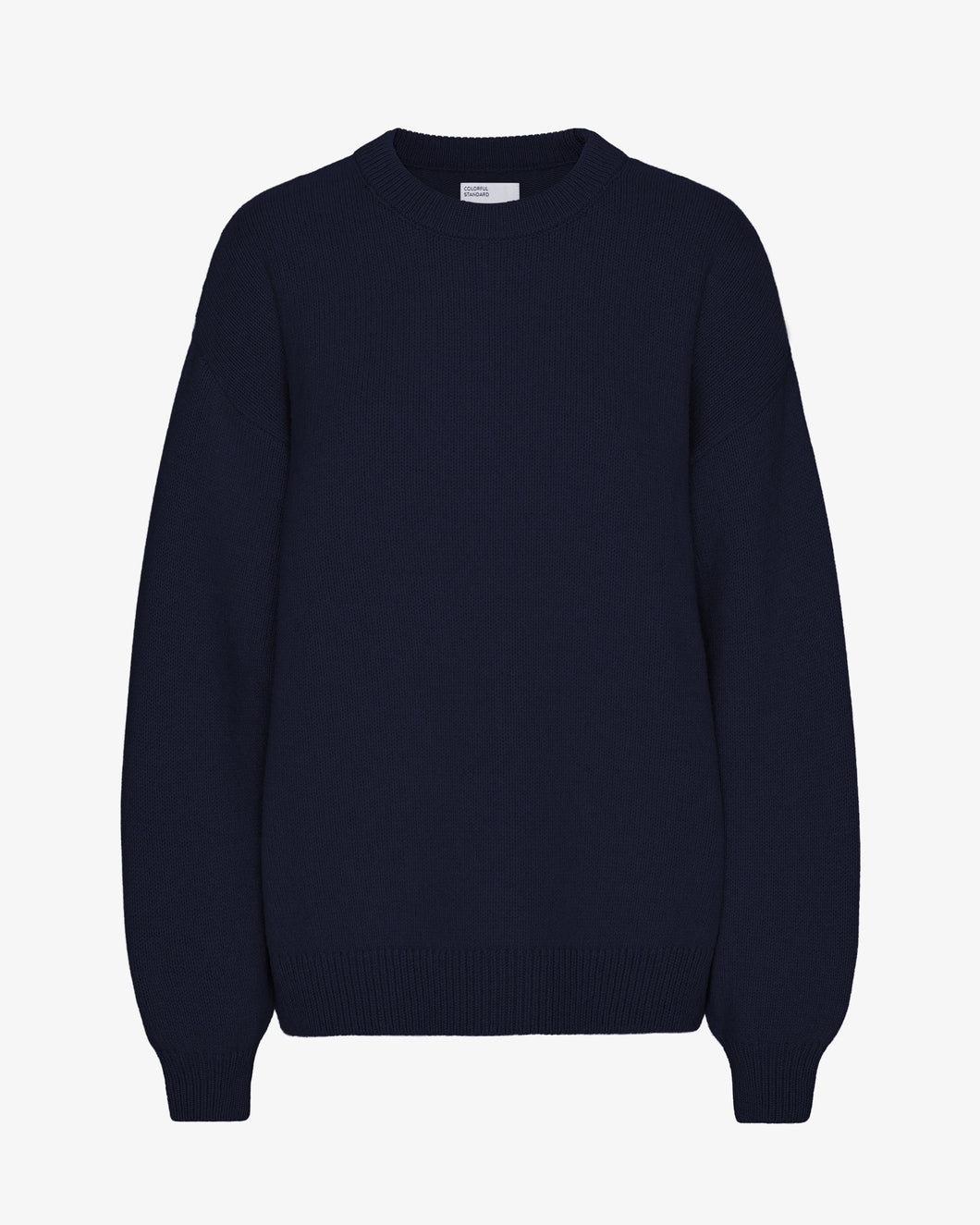 Colourful Standard Women's Merino Wool Oversized Crew in Navy Blue the epitome of cozy sophistication. Crafted from premium recycled merino wool, this oversized crewneck sweater offers unparalleled softness, breathability, and temperature regulation for year-round comfort.Available at aprilmae - a womenswear boutique located in Chiswick west London specialising in contemporary, everyday clothing for women.  Visit our shop on Devonshire Road W4 for the latest arrivals.