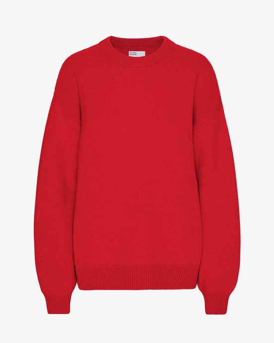 Colourful Standard Women's Merino Wool Oversized Crew in Scarlet Red the epitome of cozy sophistication. Crafted from premium recycled merino wool, this oversized crewneck sweater offers unparalleled softness, breathability, and temperature regulation for year-round comfort.Available at aprilmae - a womenswear boutique located in Chiswick west London specialising in contemporary, everyday clothing for women.  Visit our shop on Devonshire Road W4 for the latest arrivals.