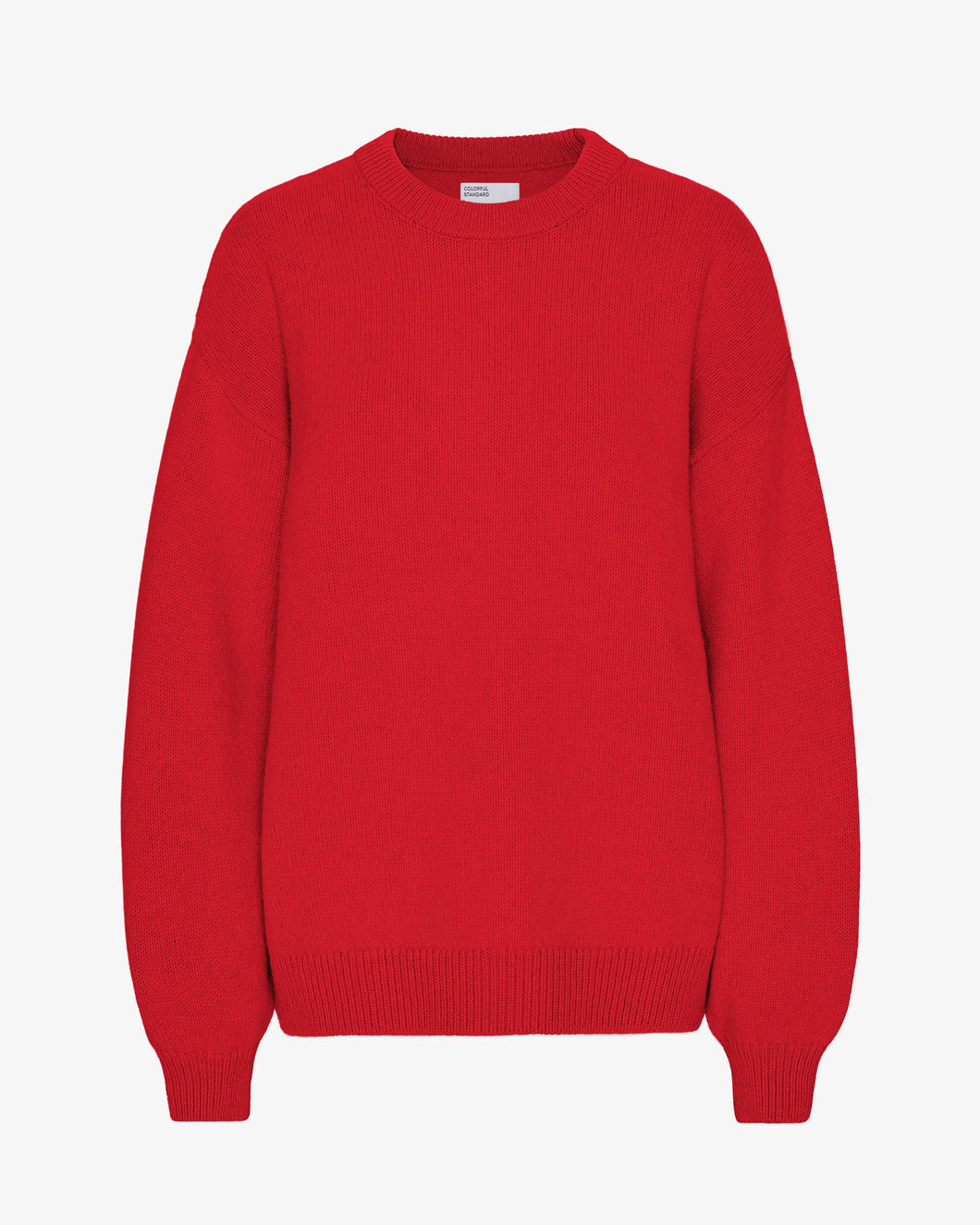 Colourful Standard Women's Merino Wool Oversized Crew in Scarlet Red the epitome of cozy sophistication. Crafted from premium recycled merino wool, this oversized crewneck sweater offers unparalleled softness, breathability, and temperature regulation for year-round comfort.Available at aprilmae - a womenswear boutique located in Chiswick west London specialising in contemporary, everyday clothing for women.  Visit our shop on Devonshire Road W4 for the latest arrivals.