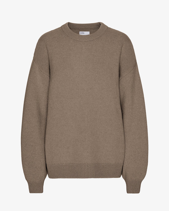 Colourful Standard Women's Merino Wool Oversized Crew in Warm taupe the epitome of cozy sophistication. Crafted from premium recycled merino wool, this oversized crewneck sweater offers unparalleled softness, breathability, and temperature regulation for year-round comfort.Available at aprilmae - a womenswear boutique located in Chiswick west London specialising in contemporary, everyday clothing for women.  Visit our shop on Devonshire Road W4 for the latest arrivals.