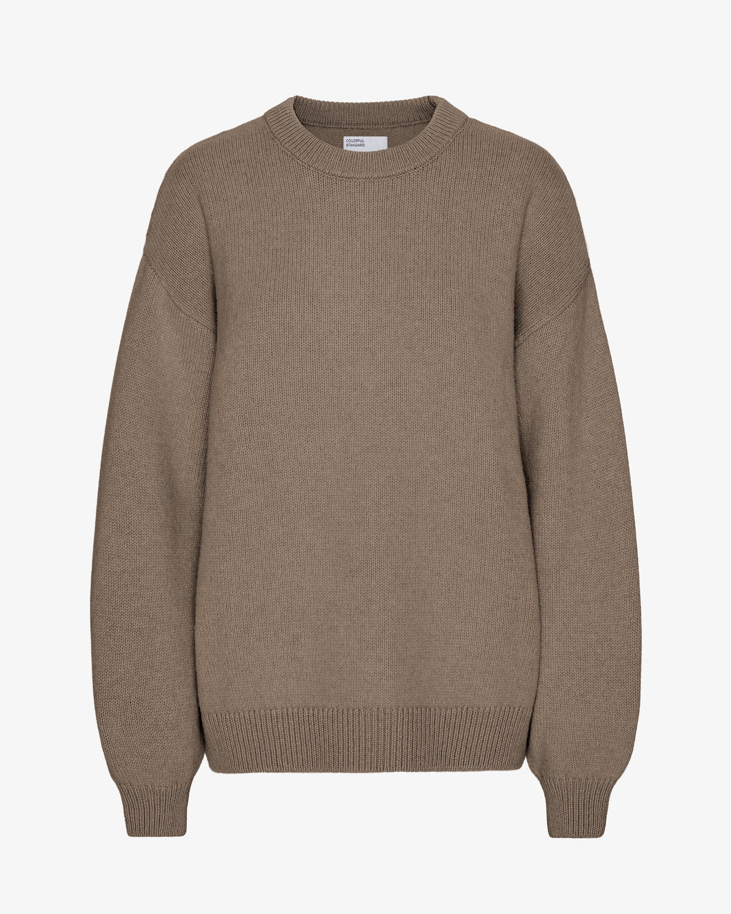 Colourful Standard Women's Merino Wool Oversized Crew in Warm taupe the epitome of cozy sophistication. Crafted from premium recycled merino wool, this oversized crewneck sweater offers unparalleled softness, breathability, and temperature regulation for year-round comfort.Available at aprilmae - a womenswear boutique located in Chiswick west London specialising in contemporary, everyday clothing for women.  Visit our shop on Devonshire Road W4 for the latest arrivals.