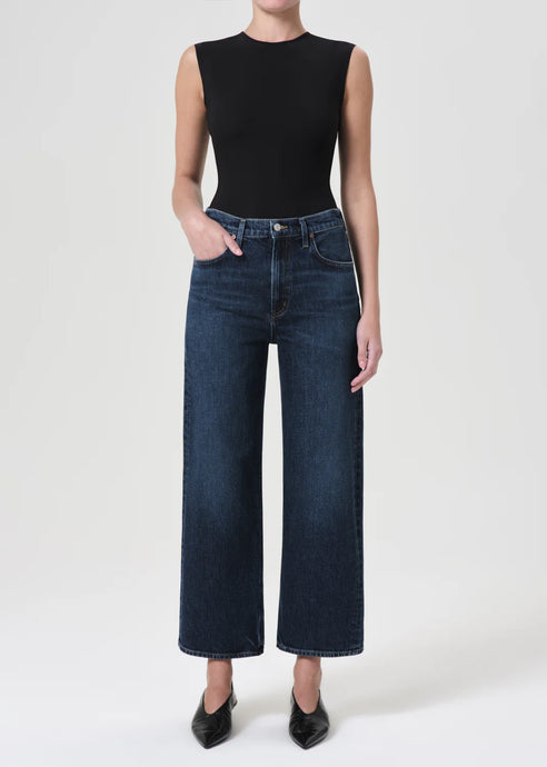 The AGOLDE Ren Jean is designed with a flattering high-rise waist, a relaxed fit through the hips, and finished with a wide leg silhouette. Pair back to a sleek tank or bodysuit. Available at aprilmae - a womenswear boutique located in Chiswick west London specialising in contemporary, everyday clothing for women.  Visit our shop on Devonshire Road W4 for the latest arrivals from brands including Rains, Rails, Bellerose, Bonte, Vanessa Bruno, Hartford and Colorful Standard.