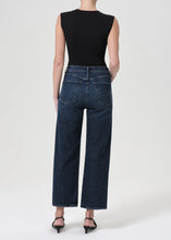Load image into Gallery viewer, The AGOLDE Ren Jean is designed with a flattering high-rise waist, a relaxed fit through the hips, and finished with a wide leg silhouette. Pair back to a sleek tank or bodysuit. Available at aprilmae - a womenswear boutique located in Chiswick west London specialising in contemporary, everyday clothing for women.  Visit our shop on Devonshire Road W4 for the latest arrivals from brands including Rains, Rails, Bellerose, Bonte, Vanessa Bruno, Hartford and Colorful Standard.
