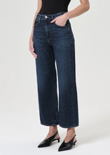 Load image into Gallery viewer, The AGOLDE Ren Jean is designed with a flattering high-rise waist, a relaxed fit through the hips, and finished with a wide leg silhouette. Pair back to a sleek tank or bodysuit. Available at aprilmae - a womenswear boutique located in Chiswick west London specialising in contemporary, everyday clothing for women.  Visit our shop on Devonshire Road W4 for the latest arrivals from brands including Rains, Rails, Bellerose, Bonte, Vanessa Bruno, Hartford and Colorful Standard.
