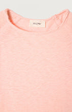 Load image into Gallery viewer, Close-up of a pink garment with a brand label on a light gray background. The Sonoma long sleeve T-shirt from American Vintage looks great on its own or layered. It is made from a heavyweight authentic slub cotton and is soft and warm. Featuring raw edge detailing, the Sonoma has a laid-back vibe. Available at aprilmae - a womenswear boutique located in Chiswick west London specialising in contemporary, everyday clothing for women.  Visit our shop on Devonshire Road W4 for the latest arrivals.
