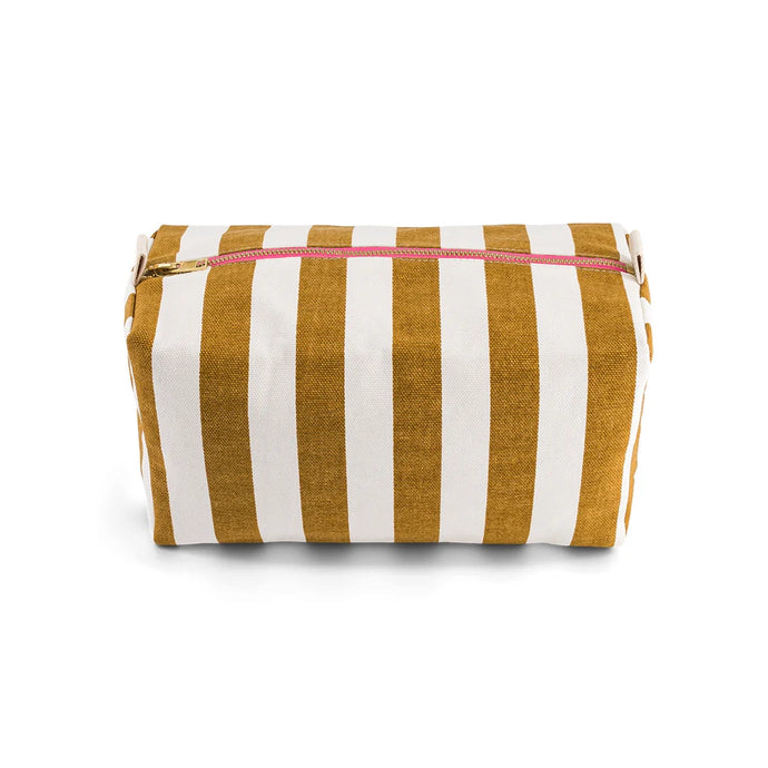 Striped toiletry pouch with mustard and white stripes by Rose in April on a white background. Available at aprilmae - a womenswear boutique located in Chiswick west London specialising in contemporary, everyday clothing for women.  Visit our shop on Devonshire Road W4 for the latest arrivals from brands including Rains, Rails, Bellerose, Bonte, Vanessa Bruno, Hartford and Colorful Standard.