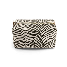 Load image into Gallery viewer, Zebra print toiletry pouch with a gold zipper on a white background from Rose in April. Available at aprilmae - a womenswear boutique located in Chiswick west London specialising in contemporary, everyday clothing for women.  Visit our shop on Devonshire Road W4 for the latest arrivals from brands including Rains, Rails, Bellerose, Bonte, Vanessa Bruno, Hartford and Colorful Standard.
