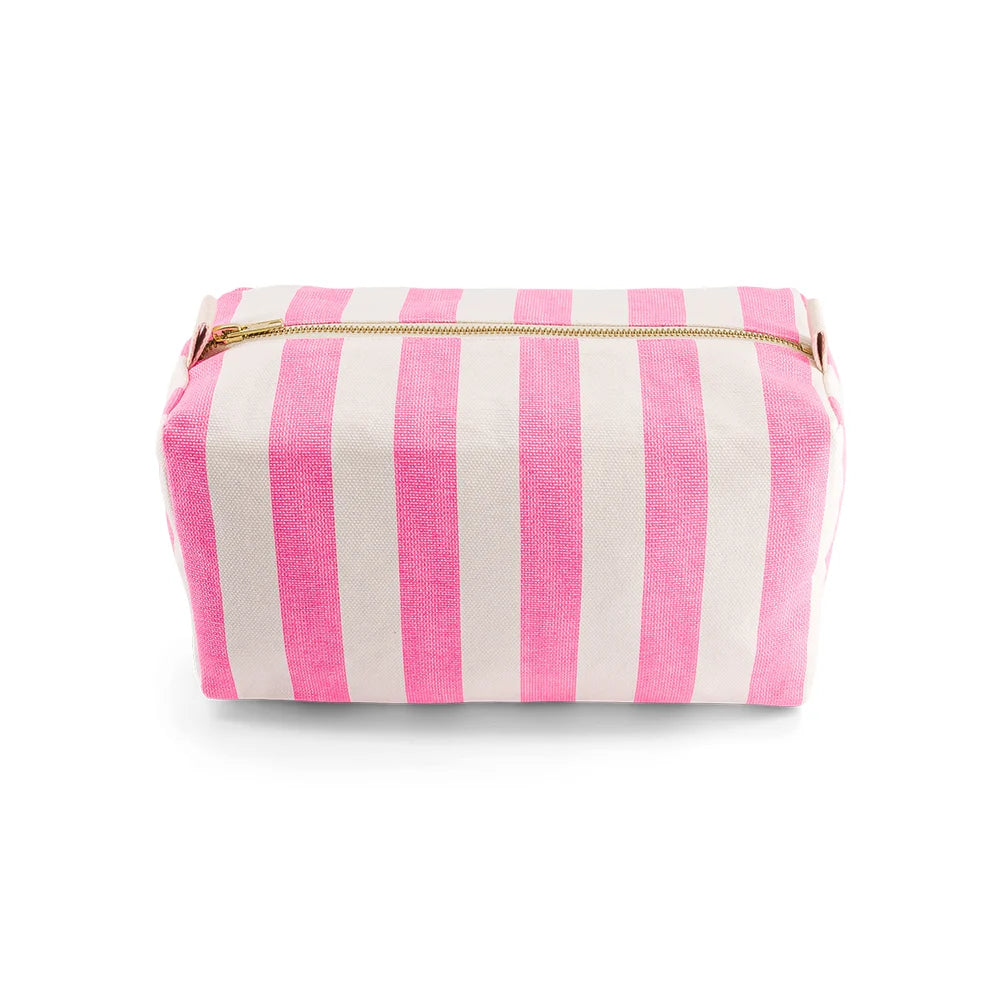 Pink and white striped toiletry pouch with a gold zipper on a white background by ROSE IN APRIL. Available at aprilmae - a womenswear boutique located in Chiswick west London specialising in contemporary, everyday clothing for women.  Visit our shop on Devonshire Road W4 for the latest arrivals from brands including Rains, Rails, Bellerose, Bonte, Vanessa Bruno, Hartford and Colorful Standard.