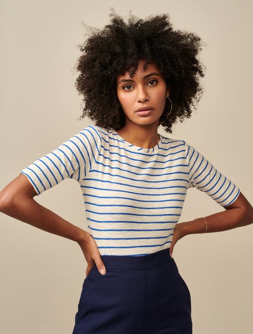 The Seas T-Shirt in nautical stripe from Bellerose is the ideal T-shirt for tucking in to a pair of jeans or a skirt. It features a slimmer fitting shape, boat neck, elbow length sleeves in a light and breezy fabric. Aprilmae contemporary designer womenswear in Chiswick.