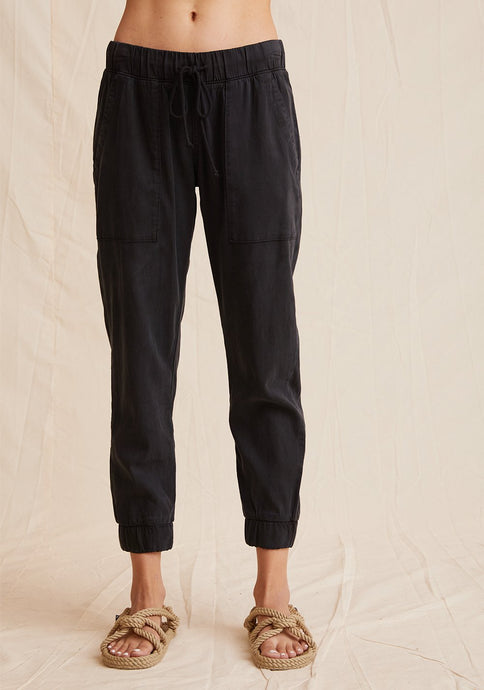 The Pocket Jogger from Bella Dahl is a new forever favourite. It has a relaxed feel to it and features a drawstring waist, large front pockets and elasticised cuffs. Shown in Black. Available at aprilmae - a womenswear boutique located in Chiswick west London specialising in contemporary, everyday clothing for women.  Visit our shop on Devonshire Road W4 for the latest arrivals from brands including Rains, Rails, Bellerose, Bonte, Vanessa Bruno, Hartford and Colorful Standard.